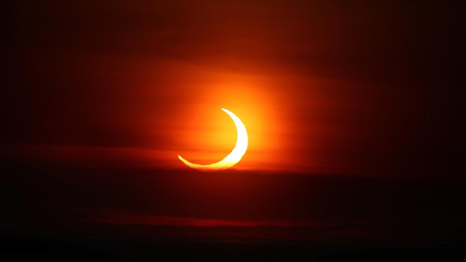 The sunrise eclipse as seen from Toronto, Canada on June 20, 2021. (Photo: Steve Russell/Toronto Star via Getty Images, Getty Images)