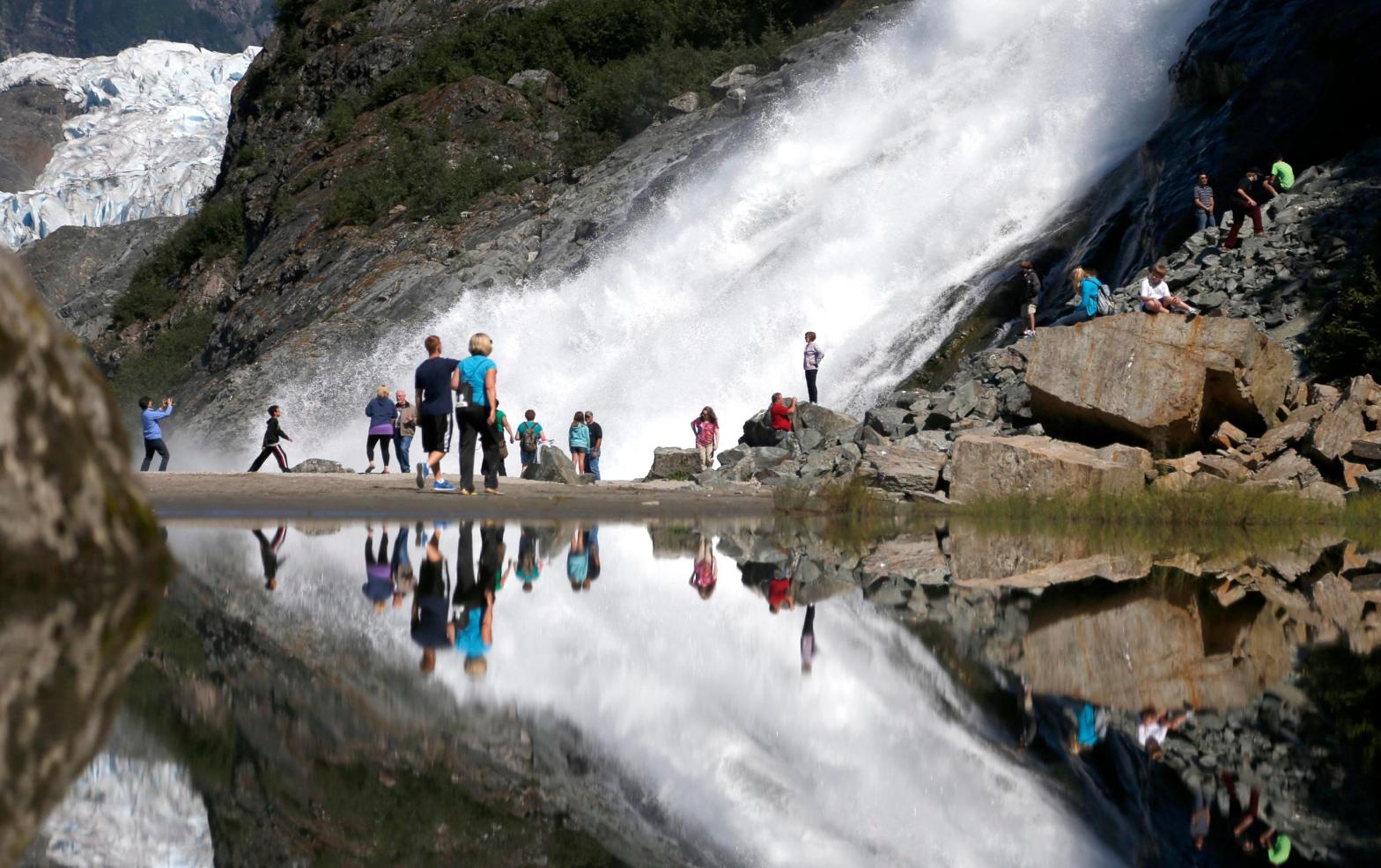 Tourists visiting the Mendenhall Glacier in the Tongass National Forest. (Photo: Charles Rex, AP)