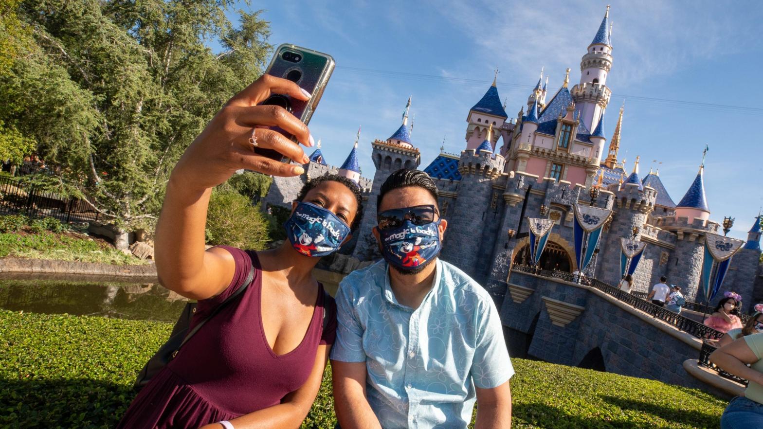Guests at Disneyland on its reopening day, April 30. Masks will no longer be required starting June 15. (Photo: Disney Parks)