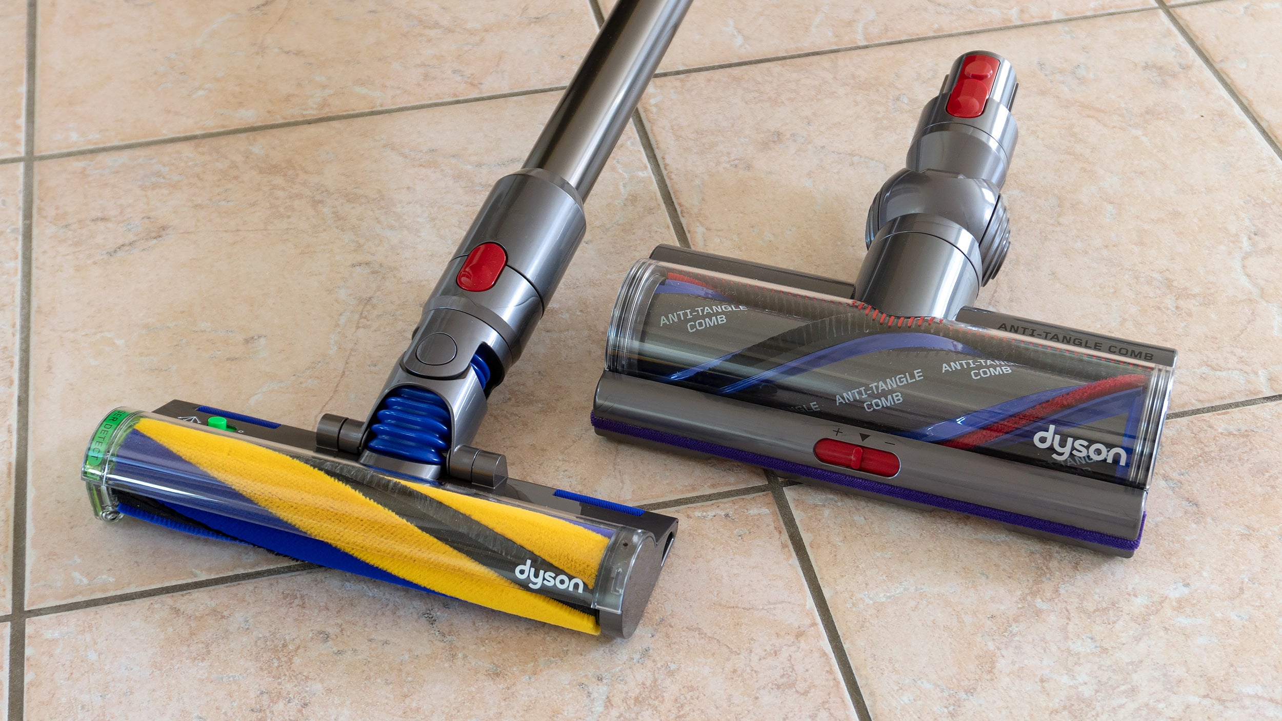Two floor cleaning heads are included with the Dyson V15 Detect, one for hardwood and tile floors, and one for rugs and carpets. (Photo: Andrew Liszewski/Gizmodo)