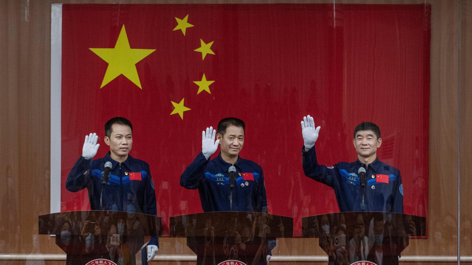 Astronauts Tang Hongbo, Nie Haisheng, and Liu Boming will blast off tomorrow. (Photo: Kevin Frayer/Getty Images, Getty Images)