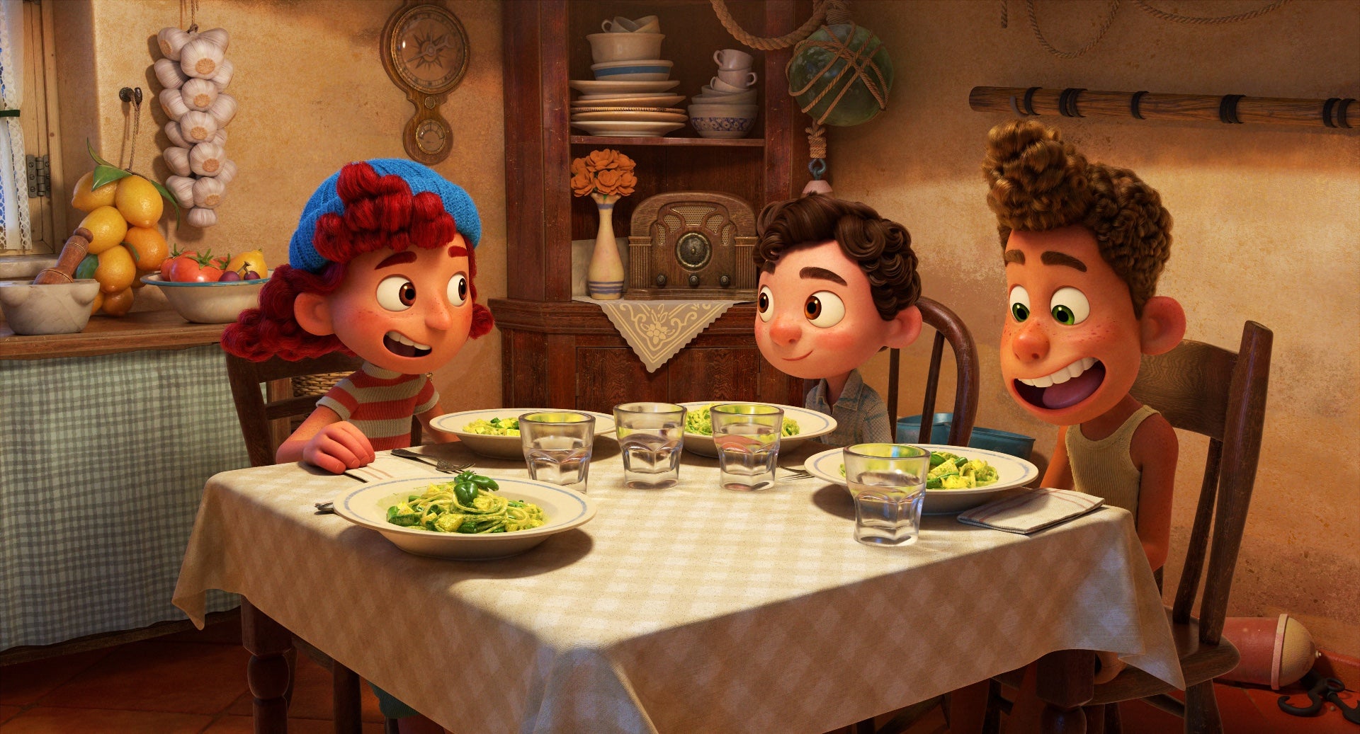 Giulia, Luca, and Alberto enjoy some pasta. (Image: Pixar)