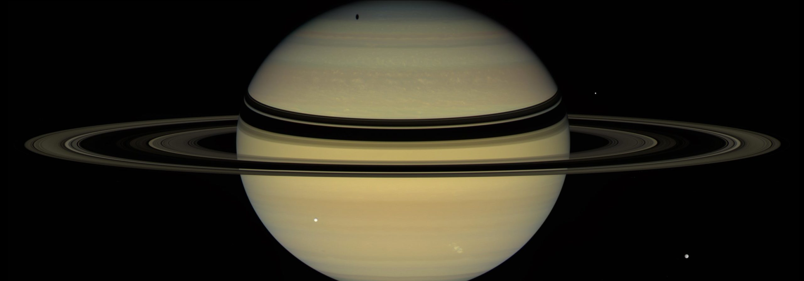 A view from NASA's Cassini spacecraft, December 6, 2007. Three moons are visible. (Image: NASA/JPL-Caltech/Space Science Institute)