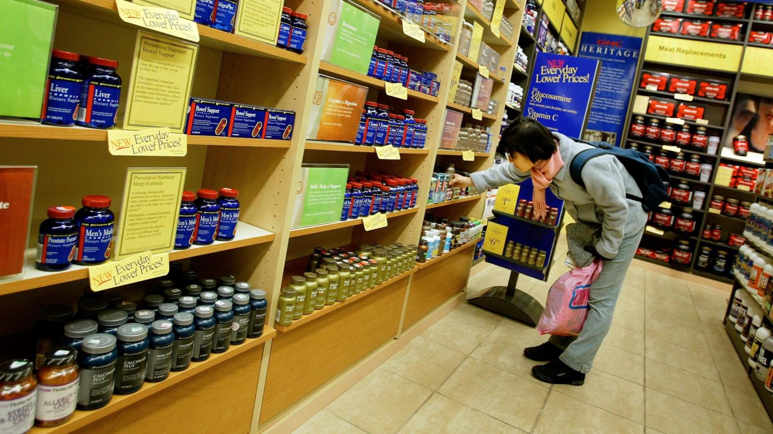 A shopper browsing through an array of vitamin supplements at a GNC vitamin store on February 19, 2003 in New York City.  (Photo: Chris Hondros, Getty Images)