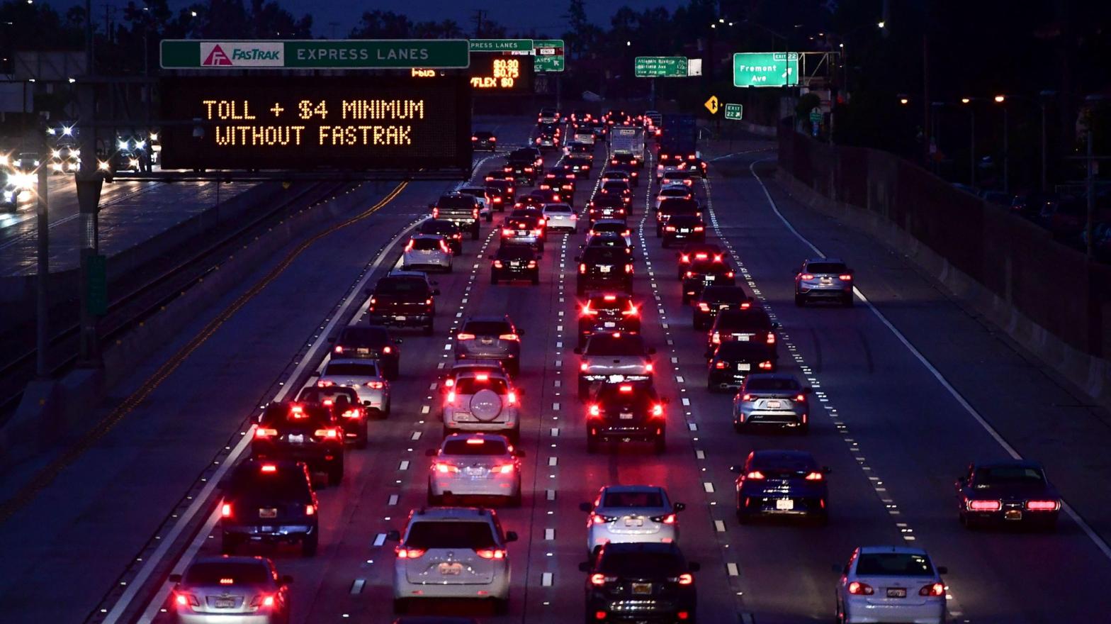 Brakelights come on as vehicles head east out of Los Angeles on the Interstate 10 freeway in Alhambra, California on May 27, 2021, ahead of the Memorial Day weekend. (Photo: Frederic J. Brown, Getty Images)
