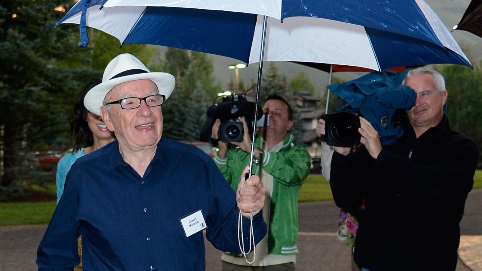 News Corp's Rupert Murdoch experiencing some weather. (Photo: Kevork Djansezian, Getty Images)