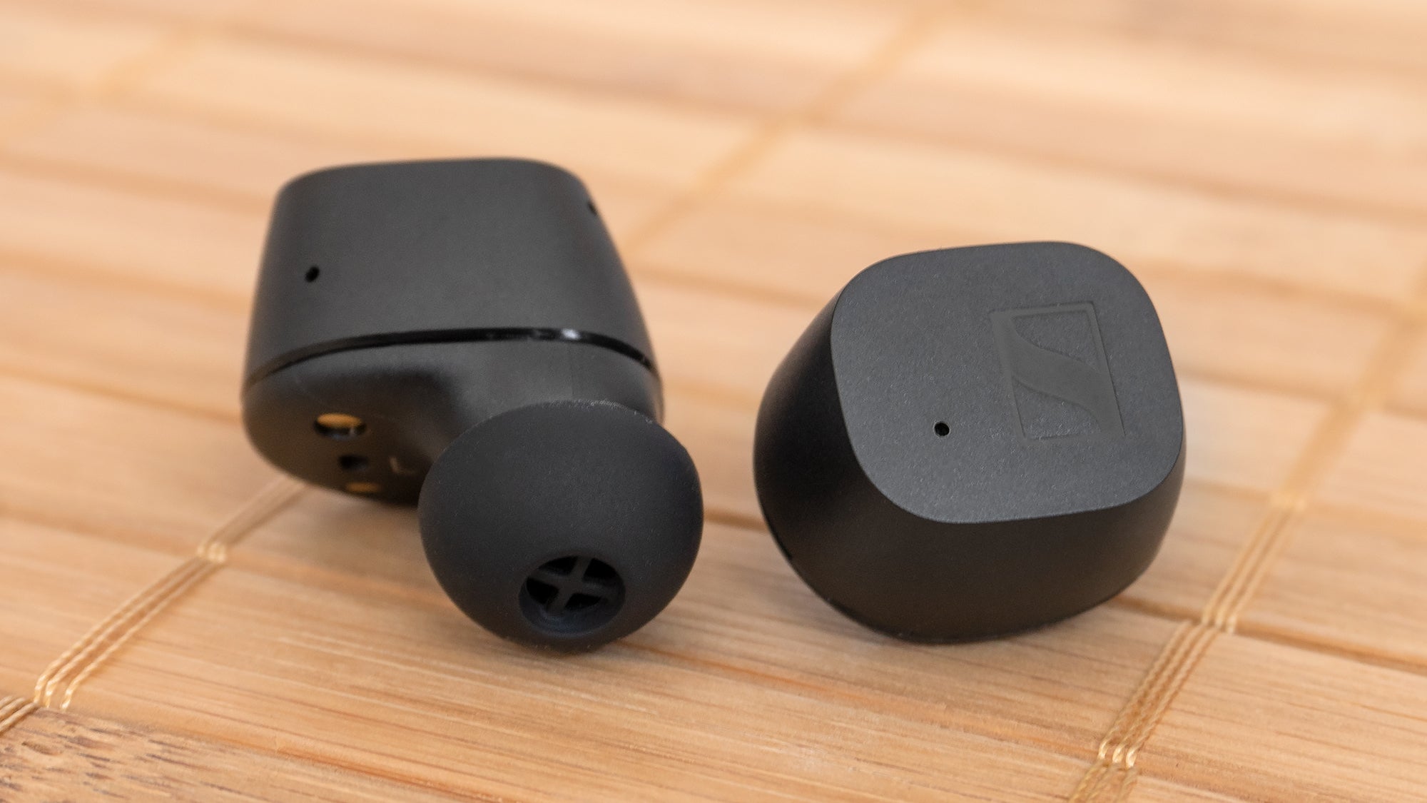 The tap controls on the CX True Wireless are very sensitive and easy to trigger without dislodging the buds, but they can also be completely disabled using the accompanying app so you'll never accidentally trigger an unwanted function. (Photo: Andrew Liszewski/Gizmodo)