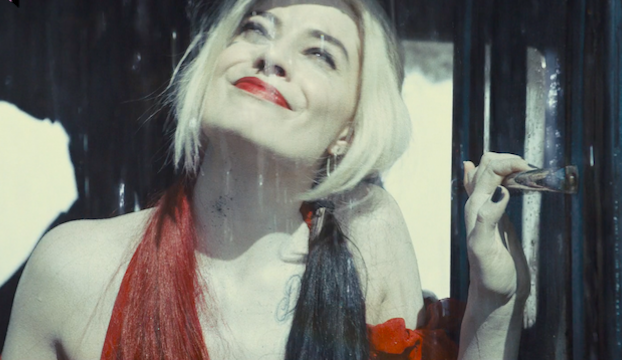 Harley Quinn appreciating the rain. (Screenshot: Warner Bros.)
