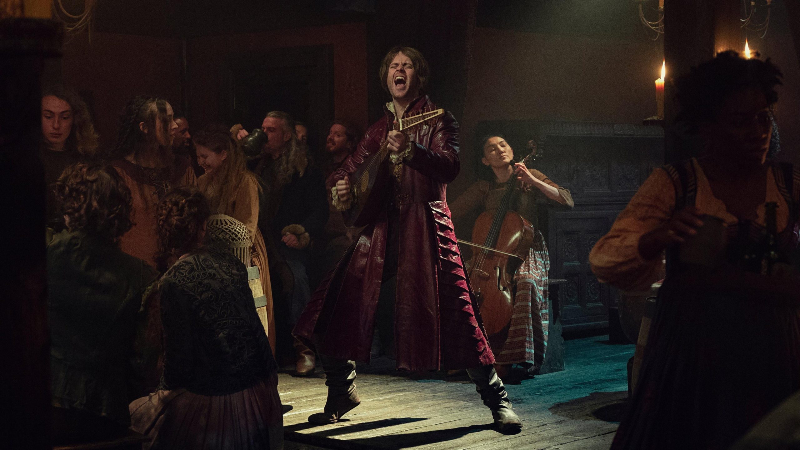 These tavern-goers may not care about his song, but we sure as hell do.  (Photo: Netflix)