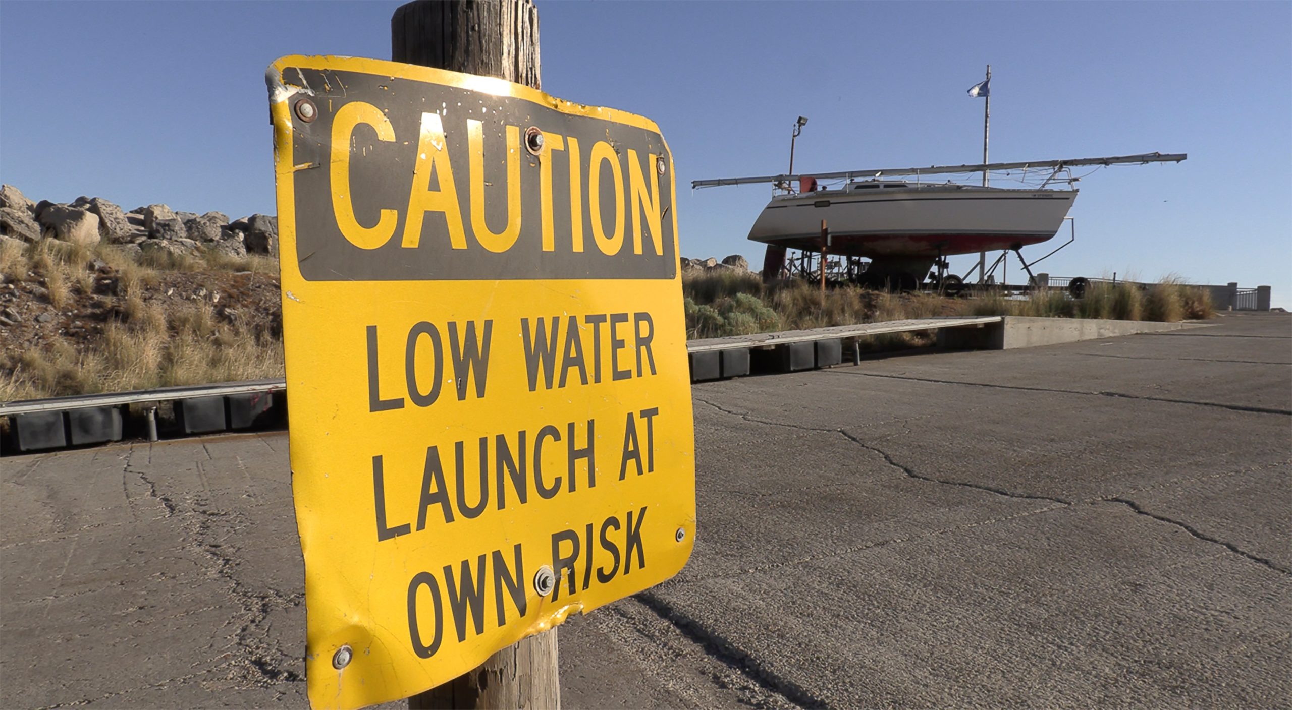 A sign warning of low water at the Great Salt Lake Marina. (Photo: Rick Bowmer, AP)