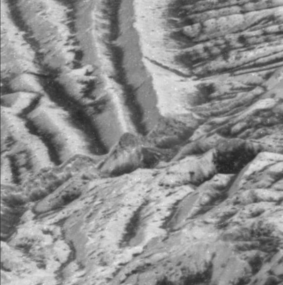 Close-up view of Europa's surface, as captured by NASA's now-ended Galileo mission. The area in the centre shows the effects of impact gardening.  (Image: NASA/JPL-Caltech)