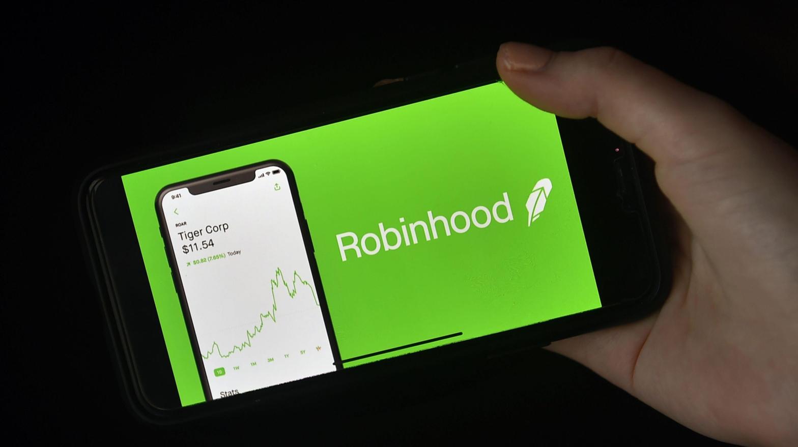 The Robinhood logo displayed on a mobile phone. (Photo: Olivier Douliery / AFP, Getty Images)
