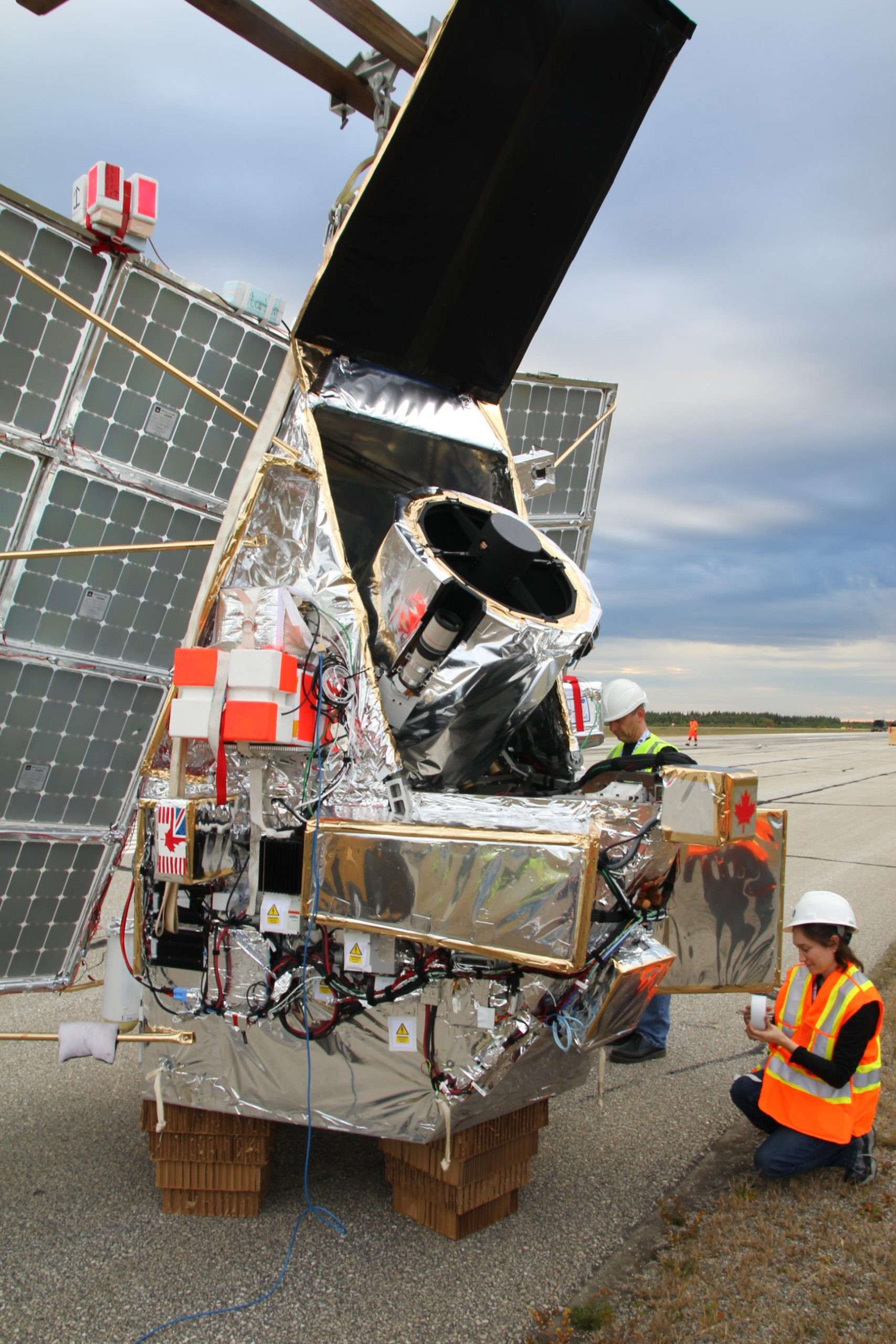 The SuperBIT telescope being prepared at the Timmins Stratospheric Balloon Base in Canada in 2019.  (Image: Steven Benton, Princeton University)