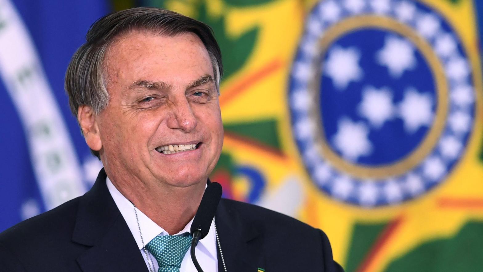 Brazilian President Jair Bolsonaro speaking at the Planalto Palace in Brasilia following the announcement Brazil's Olympic team will be sponsored by the Caixa Economica Federal state bank on June 1, 2021. (Photo: Evaristo SA / AFP, Getty Images)