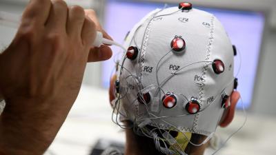 Brain-Computer Implants Will Let Corporations Mine Your Thoughts for Cash, Researchers Warn