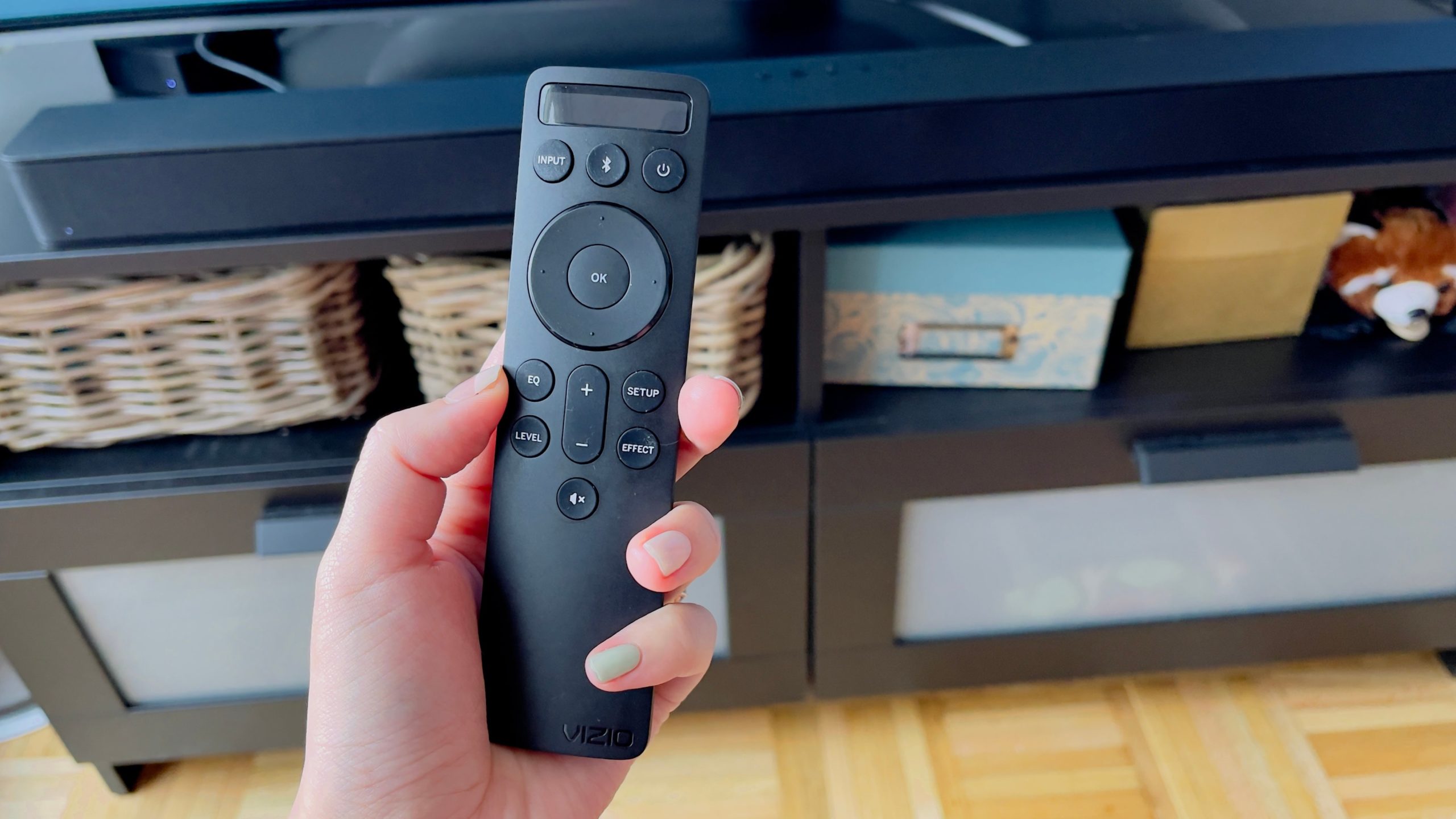 The Vizio remote isn't anything special, but makes controlling presets easy. (Photo: Victoria Song/Gizmodo)