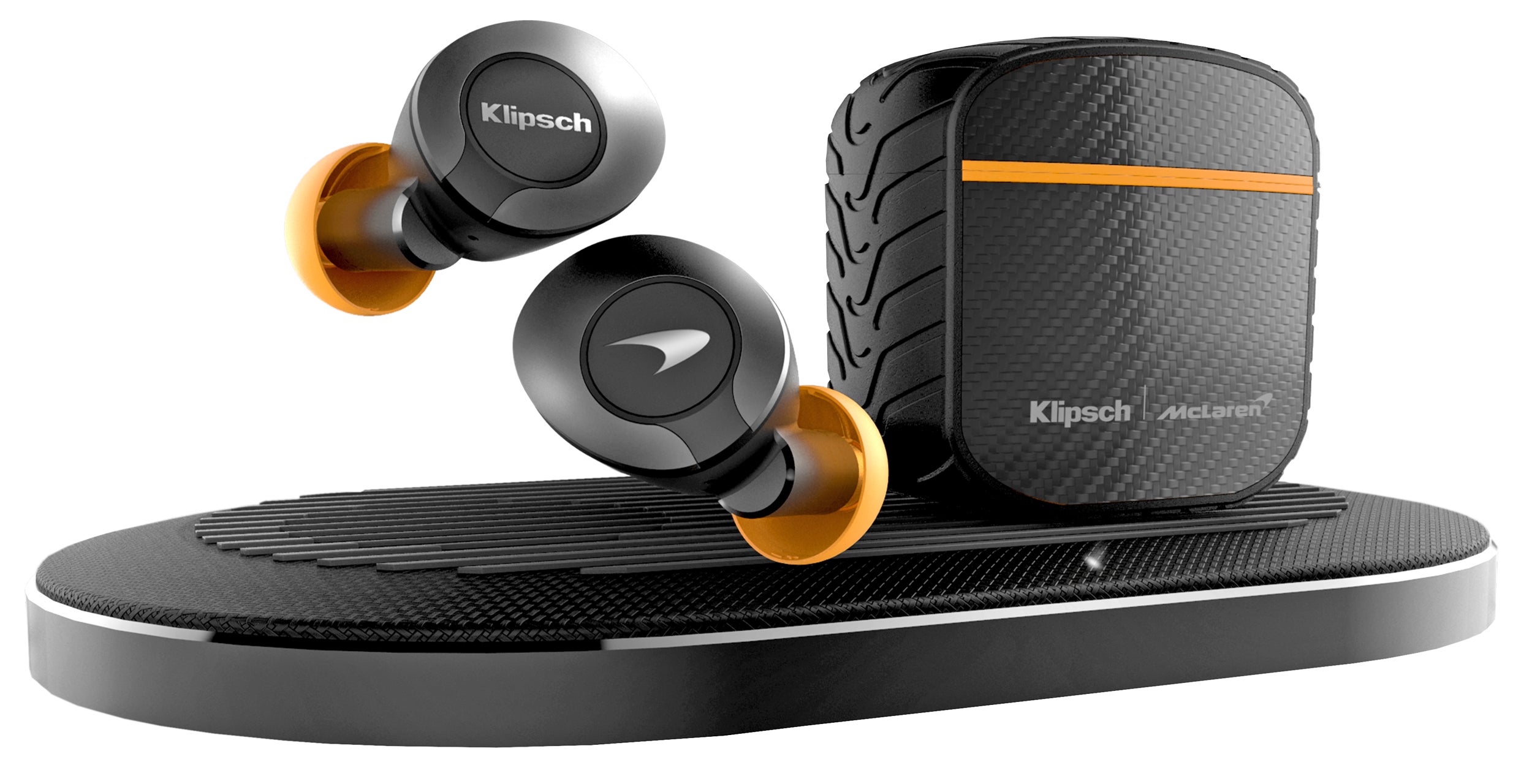 The T5 II True Wireless ANC McLaren Edition come with luxe features like carbon fibre, but for an extra $US50 ($68) you also get a dual position wireless charging pad ,which isn't a bad deal. (Image: Klipsch)