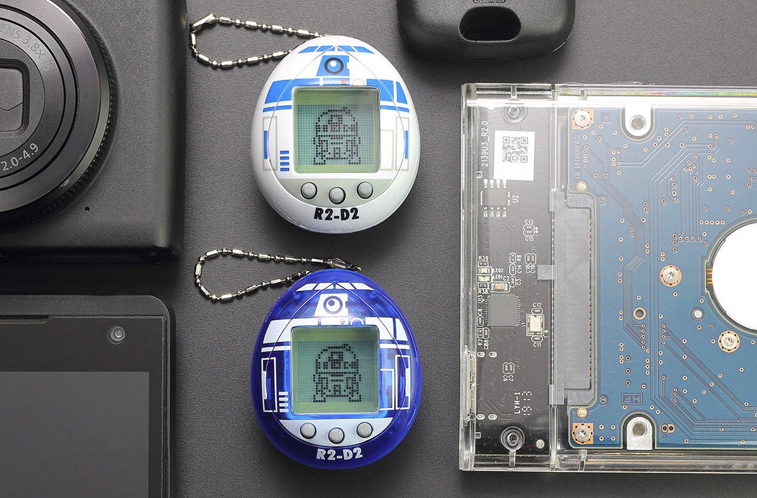 Two versions will be available, but only differ by the colour of their plastic shell. (Image: Bandai America)