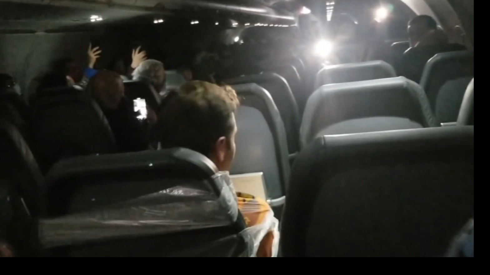 Video showing a man identified as 22-year-old Maxwell Berry on a Frontier Airlines flight from Philadelphia to Miami, after being forcibly restrained with duct tape for allegedly assaulting flight attendants. (Screenshot: ABC 6, Fair Use)