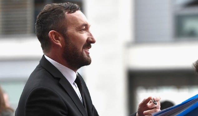 Ralph Ineson signing autographs back in 2017. (Photo: Ian Gavan, Getty Images)