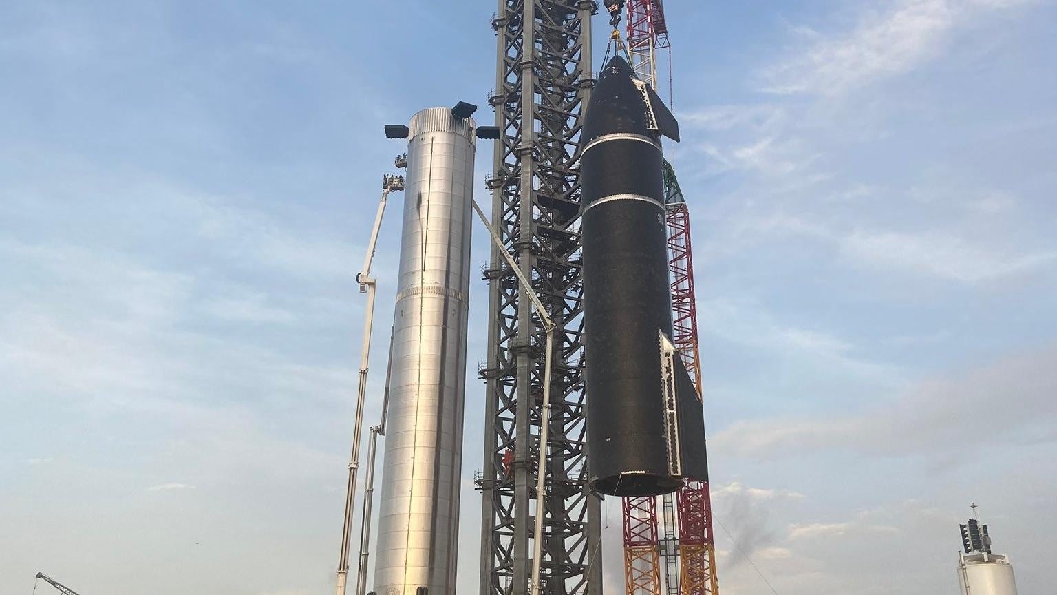 Starship SN20 as it's being lifted to the top of the Super Heavy booster.  (Image: Elon Musk/SpaceX)