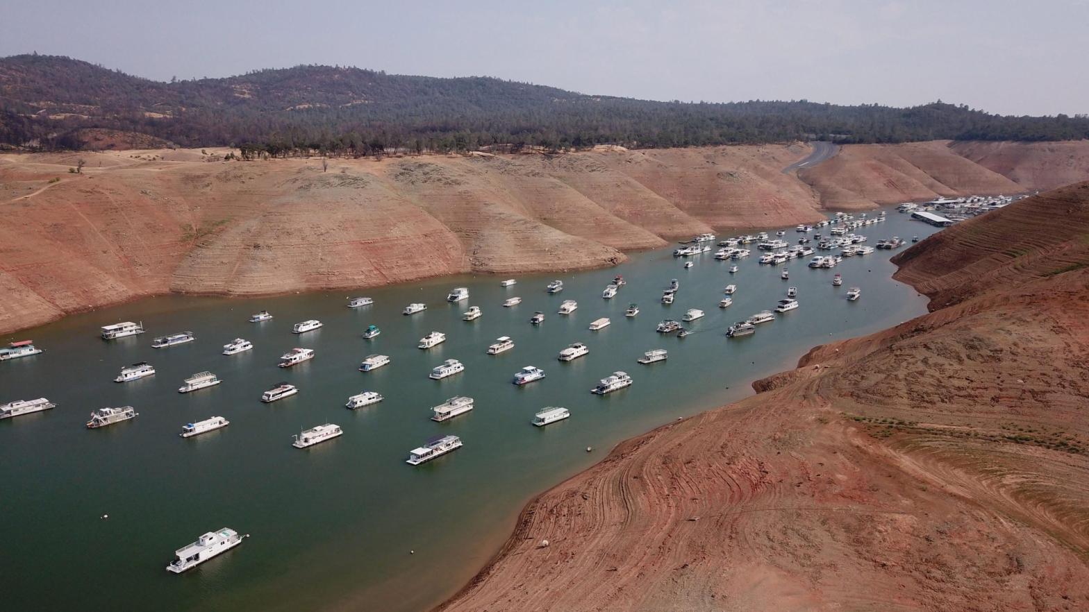 Houseboats sit in low water on Lake Oroville as California's drought emergency worsens. (Photo: Robyn Beck/AFP, Getty Images)