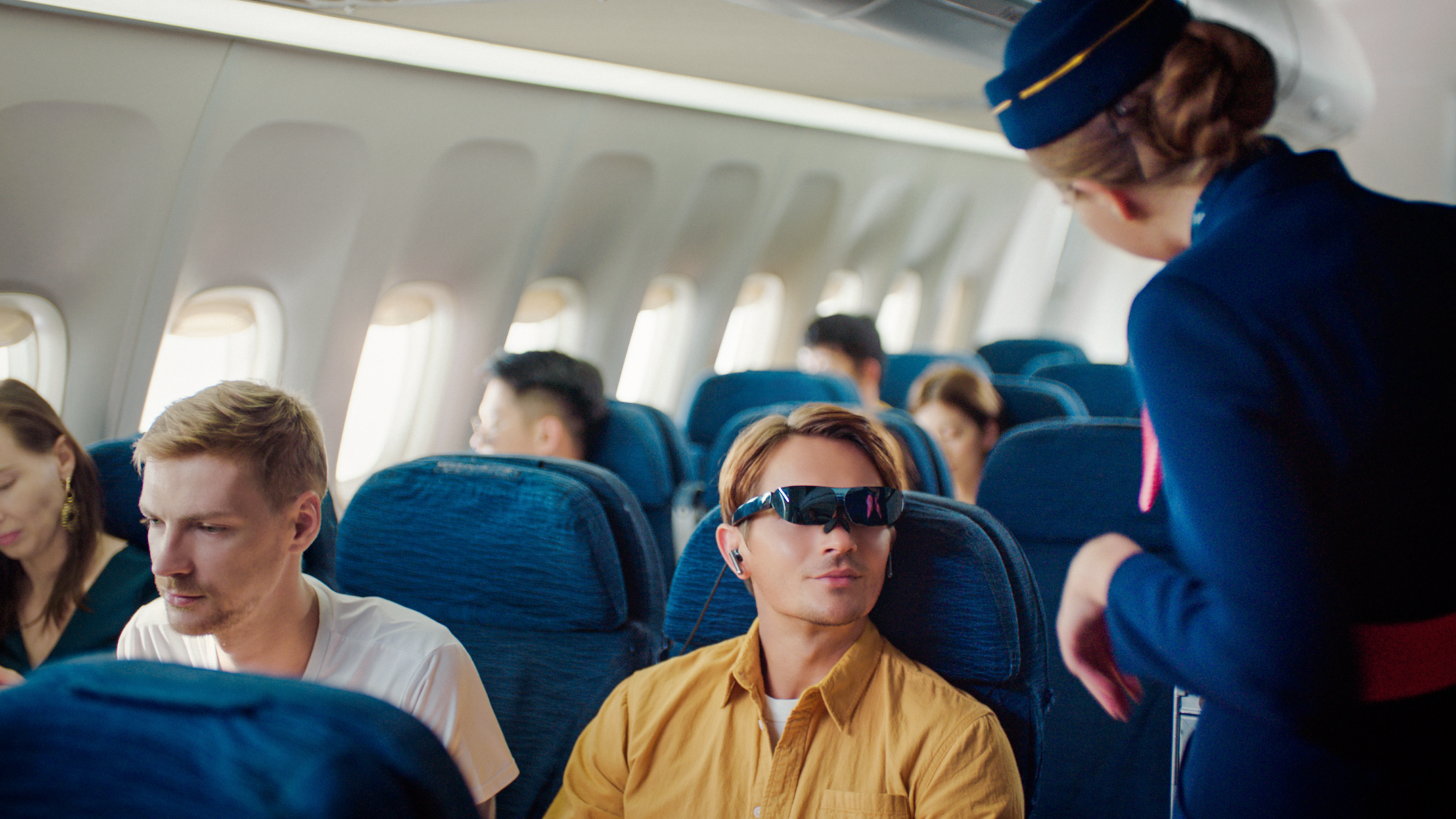 TCL NXTWEAR G smart glasses on a plane