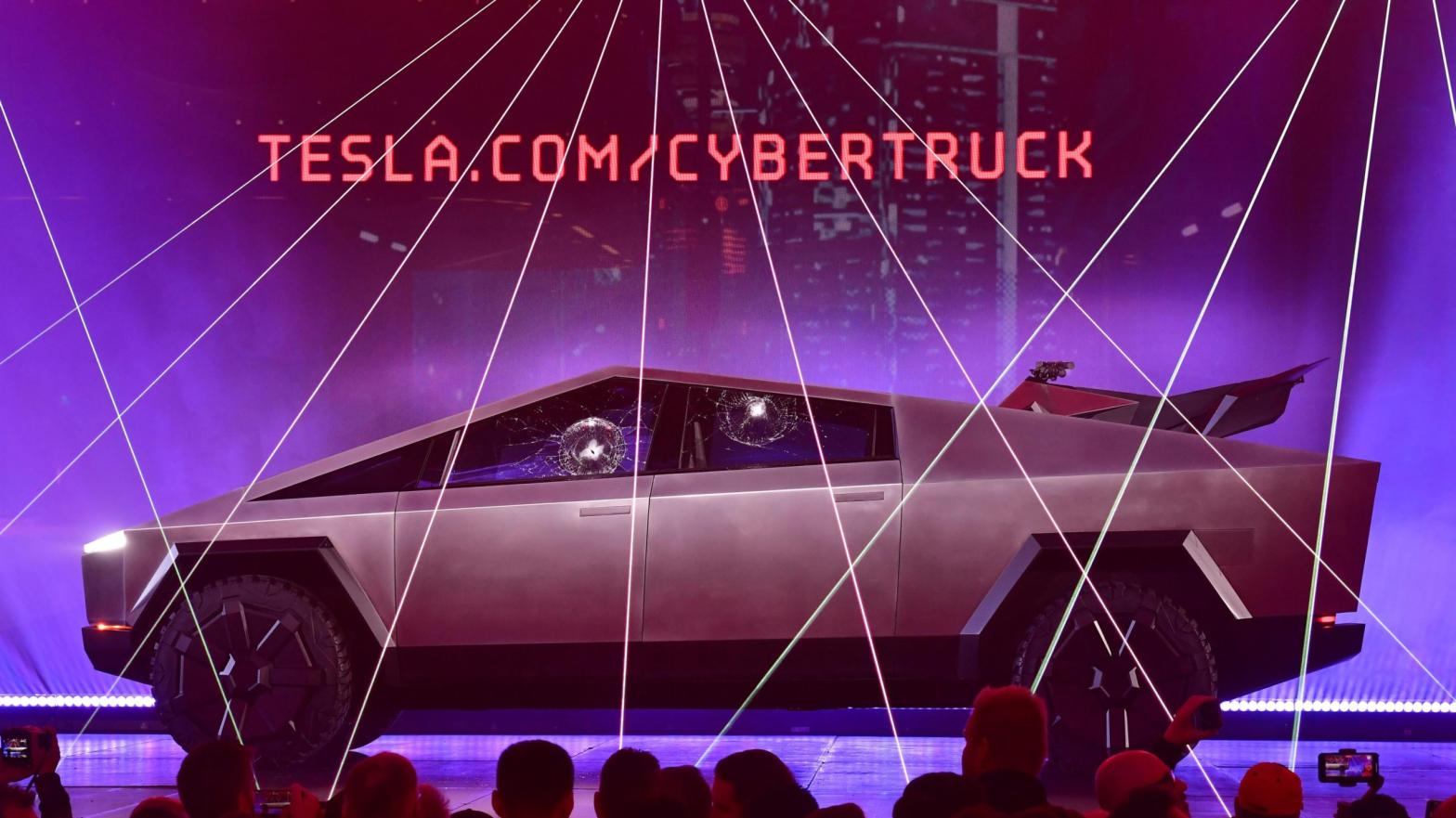 People take pictures of the newly unveiled all-electric battery-powered Tesla's Cybertruck with shattered windows after a failed resistance test on November 21, 2019. (Photo: Frederic J. Brown / AFP, Getty Images)