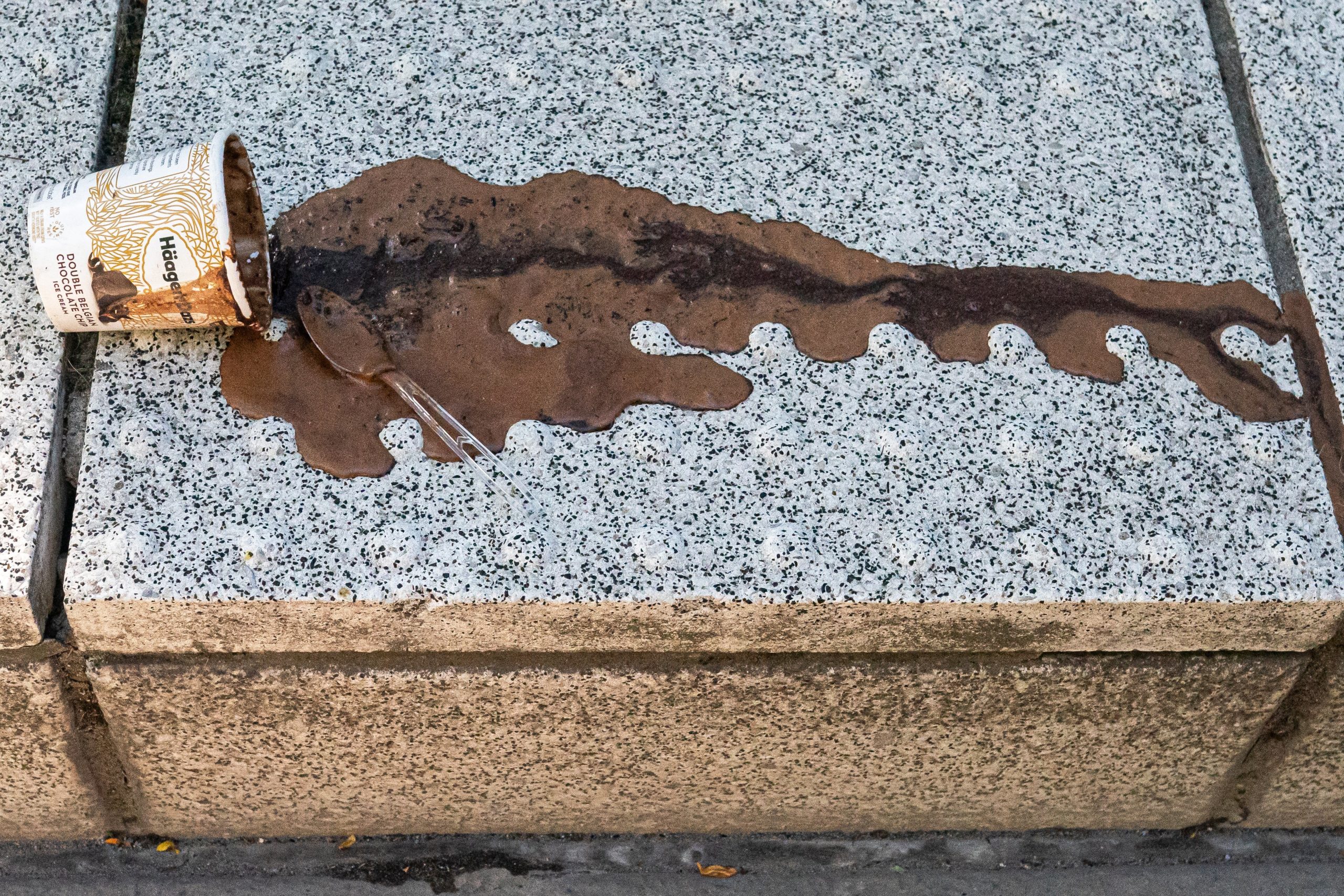 An abandoned and melted pint of ice cream drys along a city street on June 27, 2021 in Portland, Oregon.  (Photo: Nathan Howard, Getty Images)