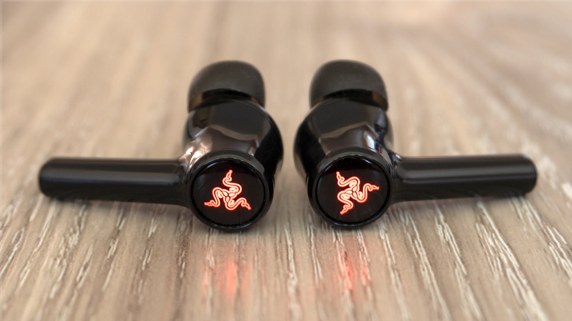 If you're looking for a relatively affordable pair of wireless earbuds, the Razer Hammerhead True Wireless Earbuds deliver excellent sound with decent noise cancellation. You'll just want to turn those LEDs off. (Photo: Andrew Liszewski - Gizmodo)