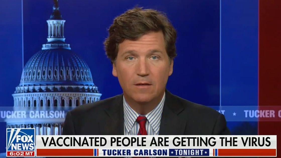 A screenshot of one of Tucker Carlson's many insipid segments about coronavirus vaccines. (Screenshot: Fox News)