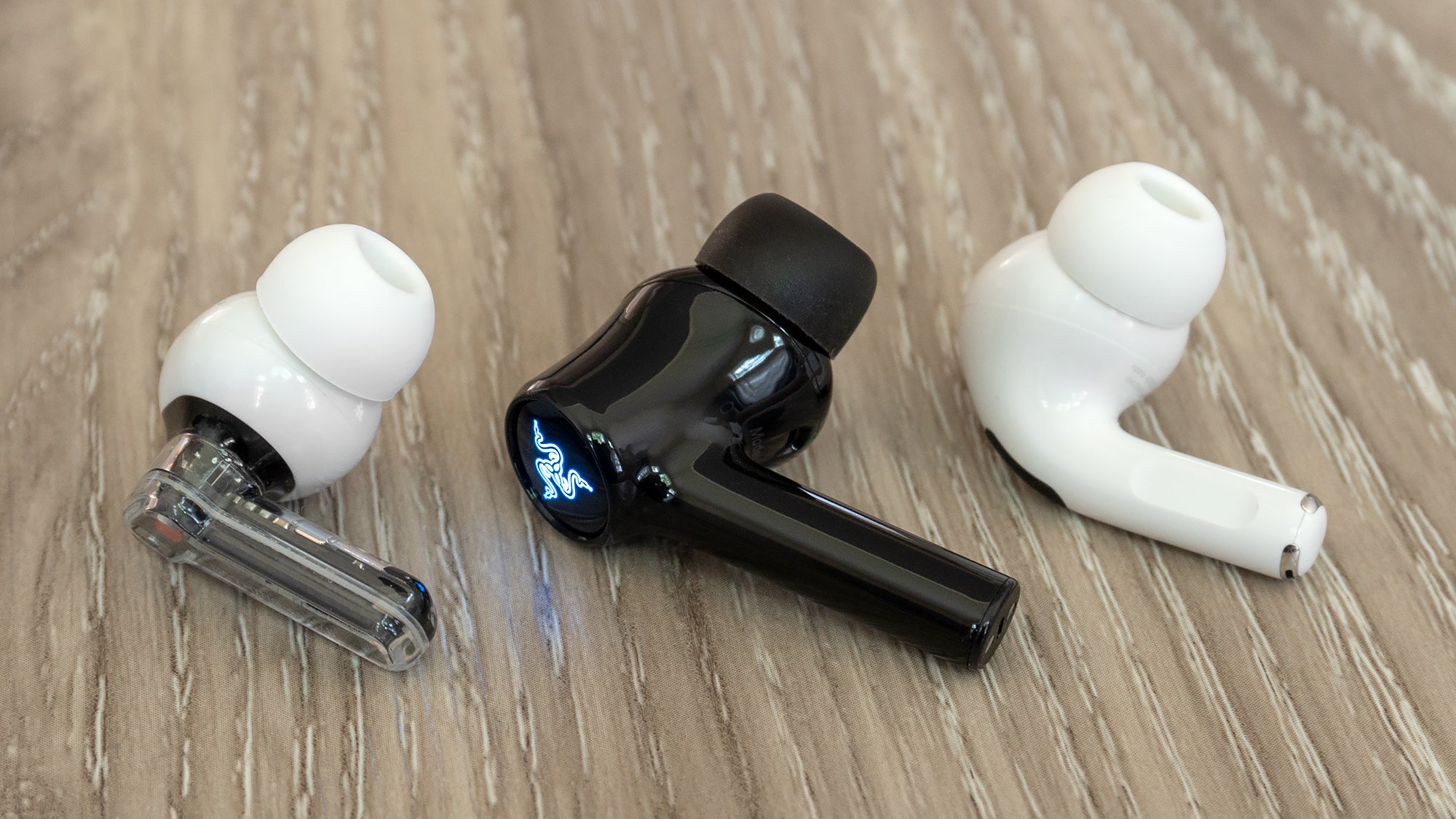 The new Razer Hammerhead True Wireless Earbuds are larger than other earbuds that use the stem design, but still feel light and secure in your ears. (Photo: Andrew Liszewski - Gizmodo)