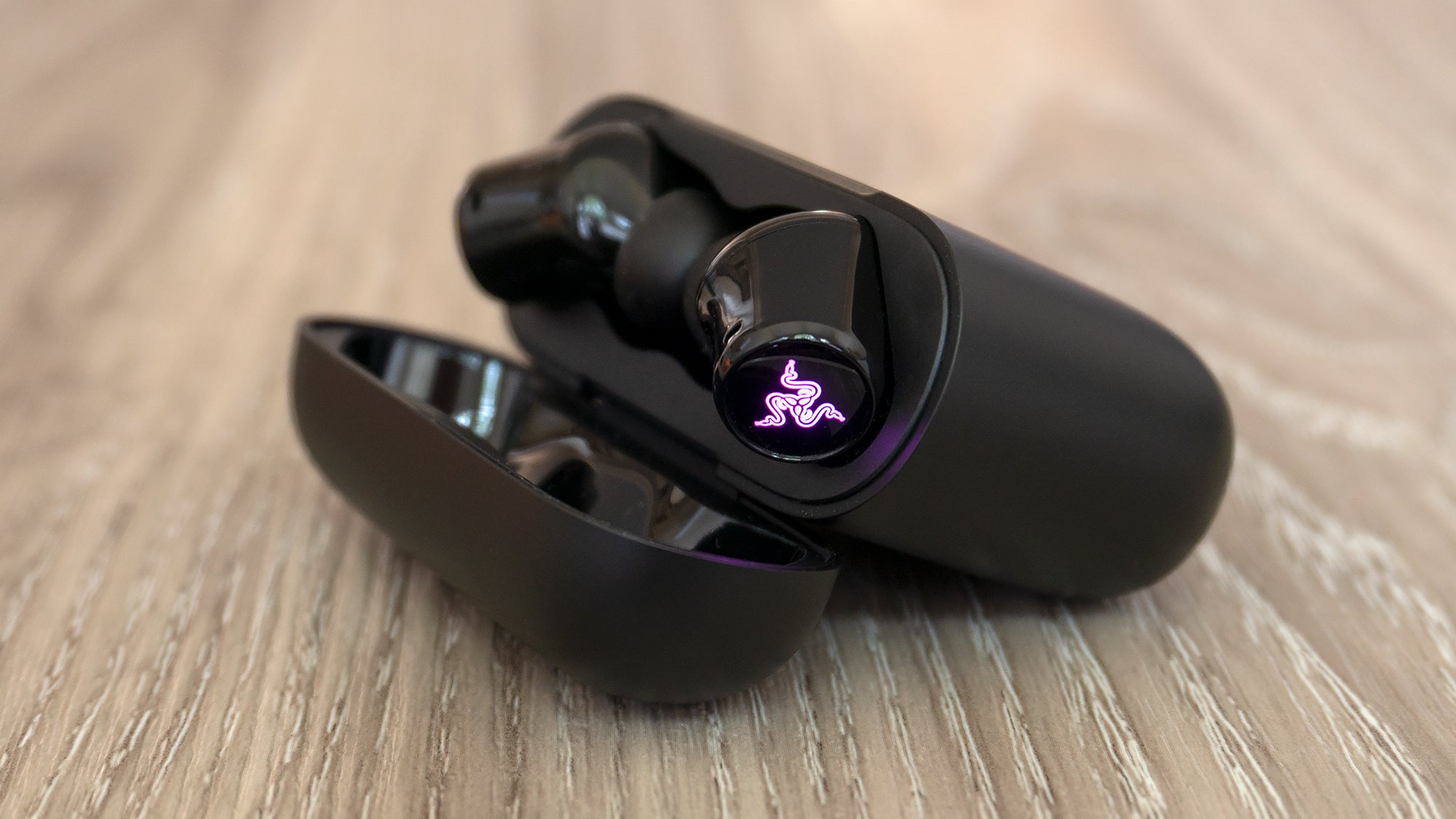 The Razer Hammerhead True Wireless Earbuds' charging case has grown, but it means you get a solid 32.5 hours of playback time in total. (Photo: Andrew Liszewski - Gizmodo)