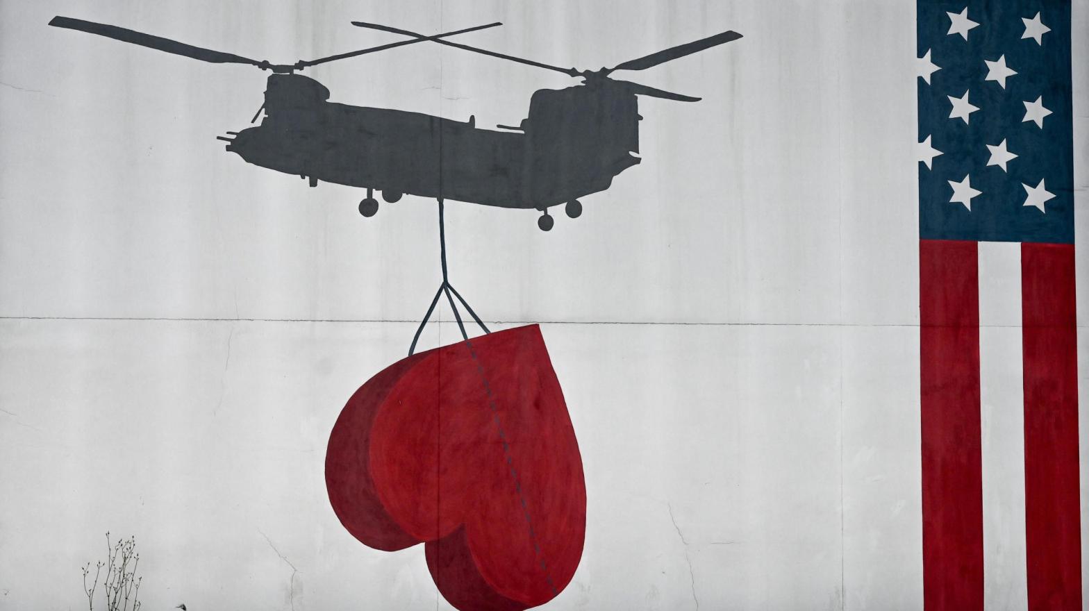 A wall mural painted on the wall of U.S. embassy in Kabul on July 30, 2021. (Photo: Sajjad Hussain / AFP, Getty Images)