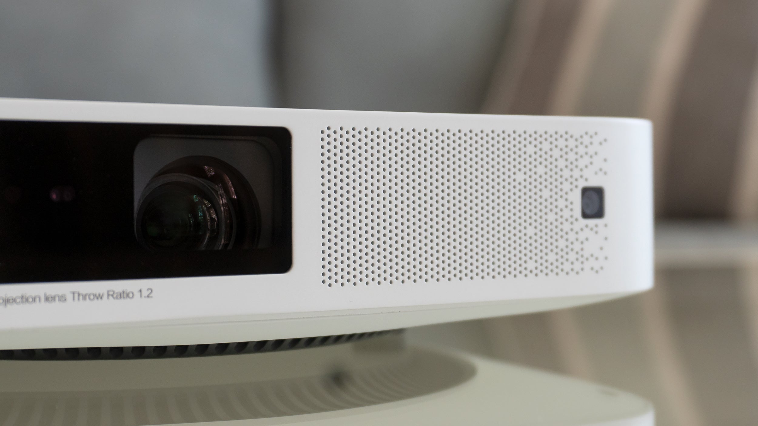 The Elfin projector features a pair of 3-watt Harman Kardon speakers built in, and while they're plenty loud, the bass performance leaves something to be desired. Don't expect the full movie theatre experience unless you pair the projector with external speakers. (Photo: Andrew Liszewski - Gizmodo)