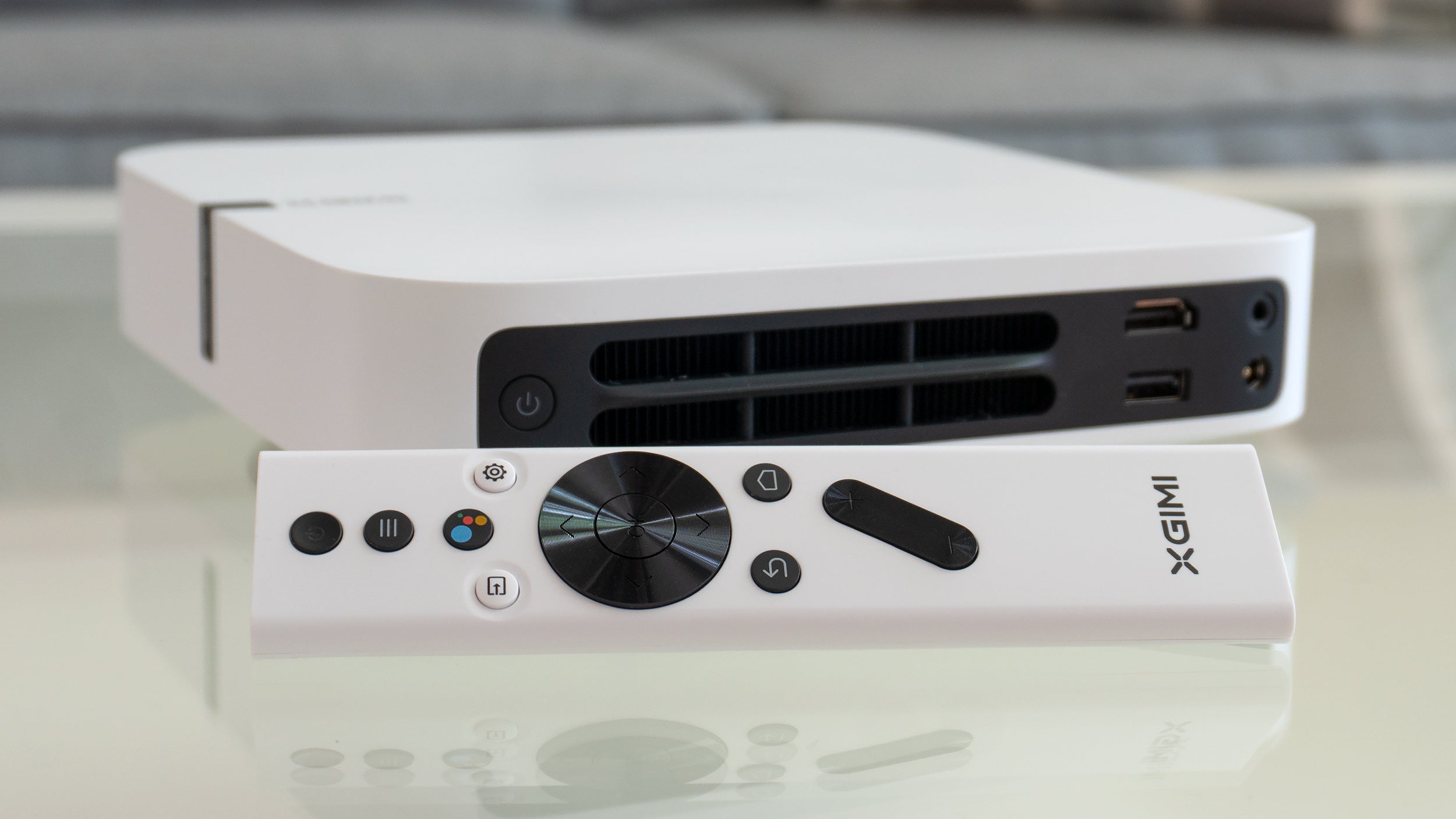 The only button on the XGIMI Elfin projector is for power, so you'll want to be extra careful not to misplace the included remote. (Photo: Andrew Liszewski - Gizmodo)