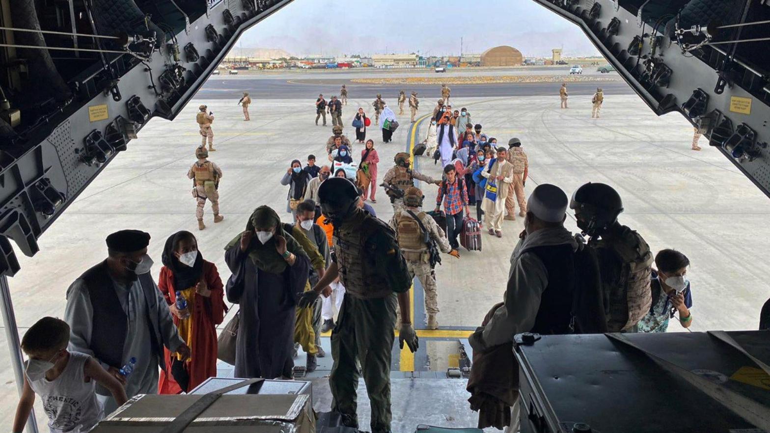People board a Spanish airforce A400 plane as part of an evacuation plan at Kabul airport in Afghanistan, Wednesday Aug. 18, 2021.  (Photo: Spanish Defence Ministry, AP)