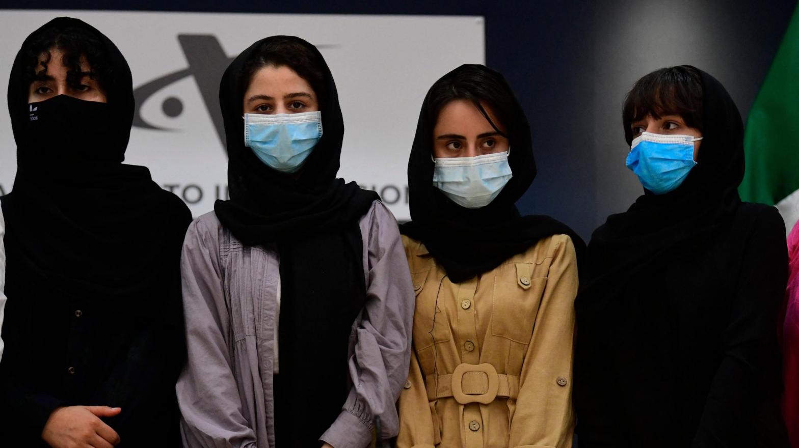 Four members of the Afghan Girls Robotics Team, as seen at Benito Juarez International Airport in Mexico City on Aug. 24, 2021, after receiving refugee status there. (Photo: Pedro Pardo / AFP, Getty Images)