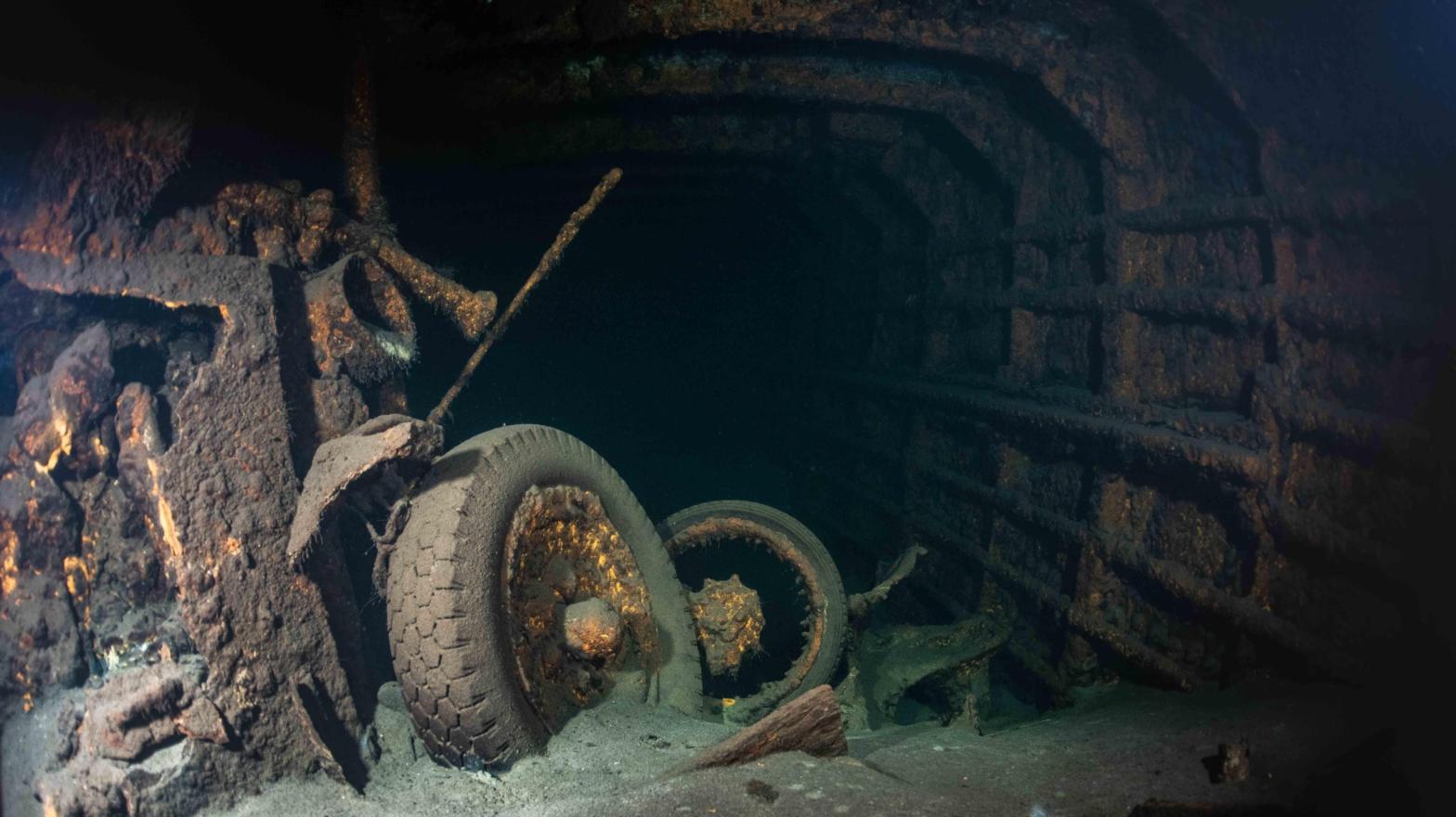 A rusted vehicle in the wreck of the Karlsruhe. (Photo: TOMASZ STACHURA / SANTI)