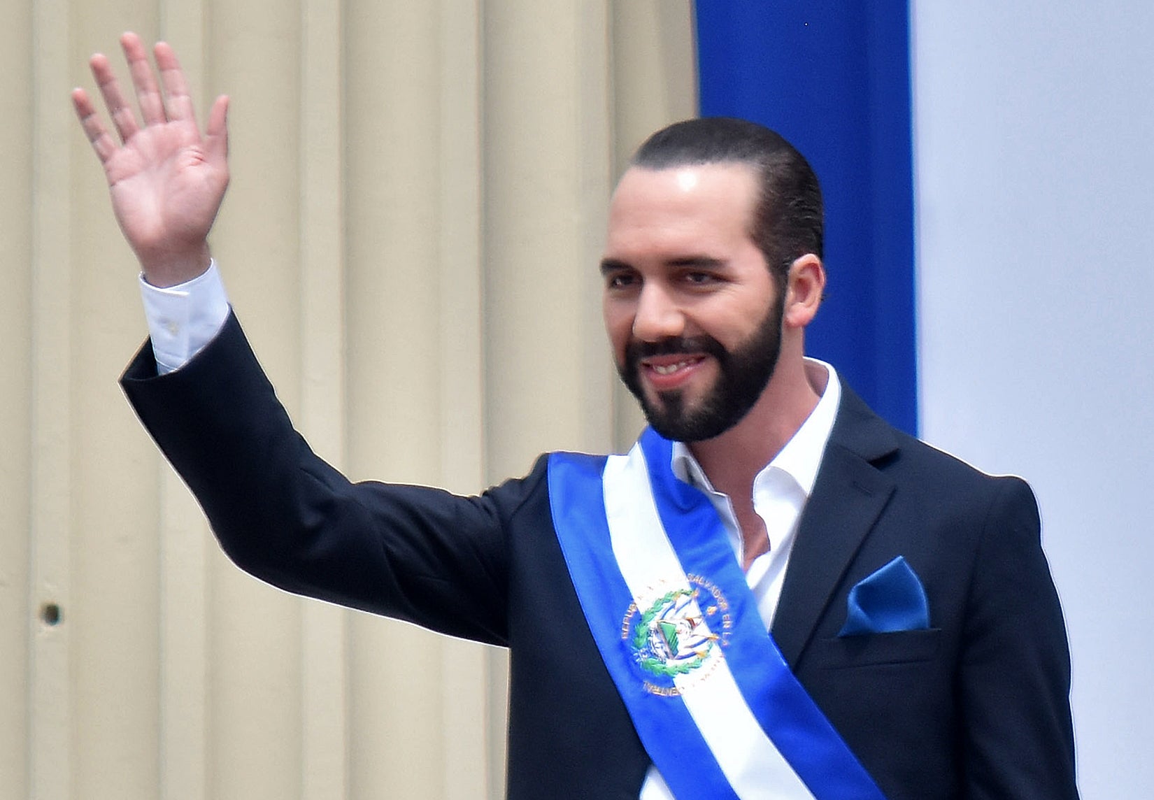 Salvador's president, Nayib Bukele, waves during his inauguration ceremony at Gerardo Barrios Square outside the National Palace in downtown San Salvador, on June 1, 2019. (Photo: Oscar Rivera/AFP, Getty Images)