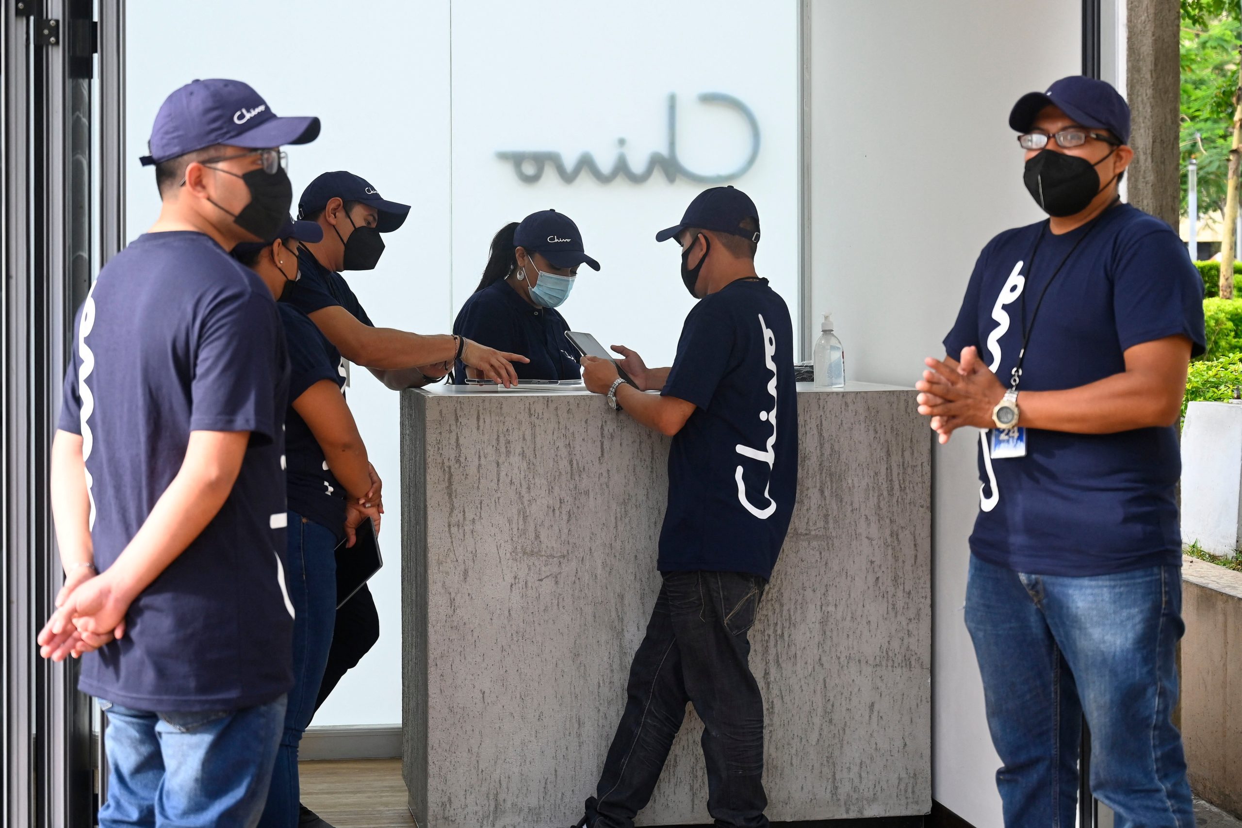 Government employees prepare to receive people who want to use the bitcoin ATM during an outage of the Chivo Wallet system in San Salvador, on September 7, 2021.  (Photo: Marvin Recinos/AFP, Getty Images)