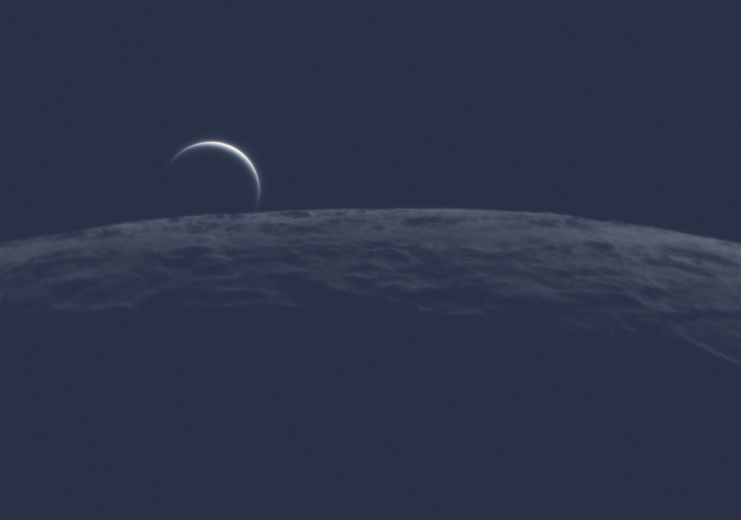 A surreal look at Venus over the Moon's horizon. (Photo: Nicolas Lefaudeux)