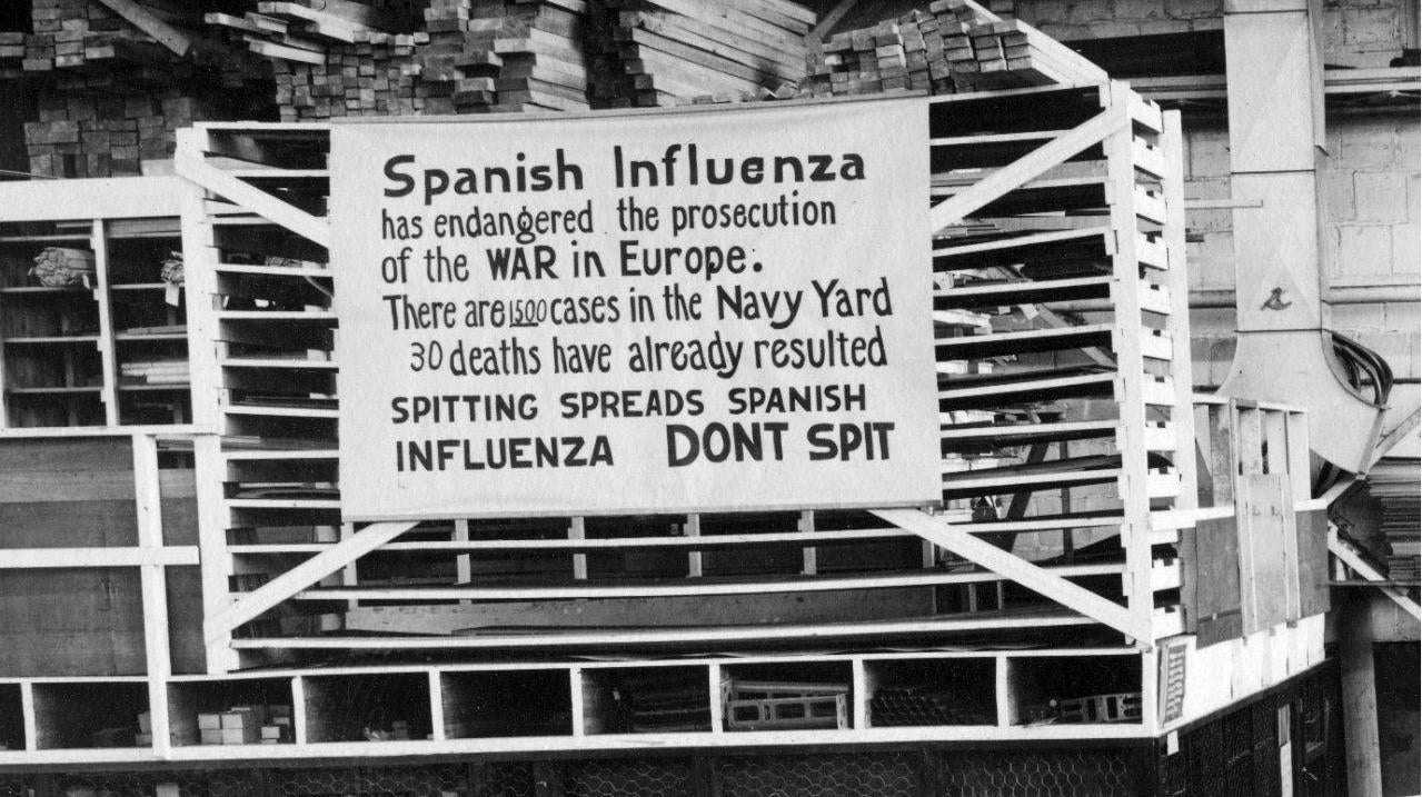 In this Oct. 19, 1918 file photo provide by the U.S. Naval History and  Heritage Command a sign is posted at the Naval Aircraft Factory in  Philadelphia that indicates, the Spanish Influenza was then extremely  active. (Photo: U.S. Naval History and Heritage Command, AP)