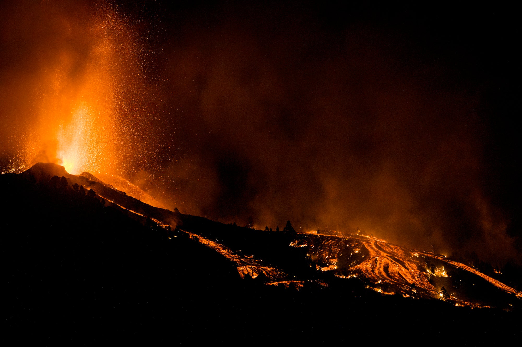 Lava flows from an eruption of a volcano at the island of La Palma. (Photo: Jonathan Rodriguez, AP)