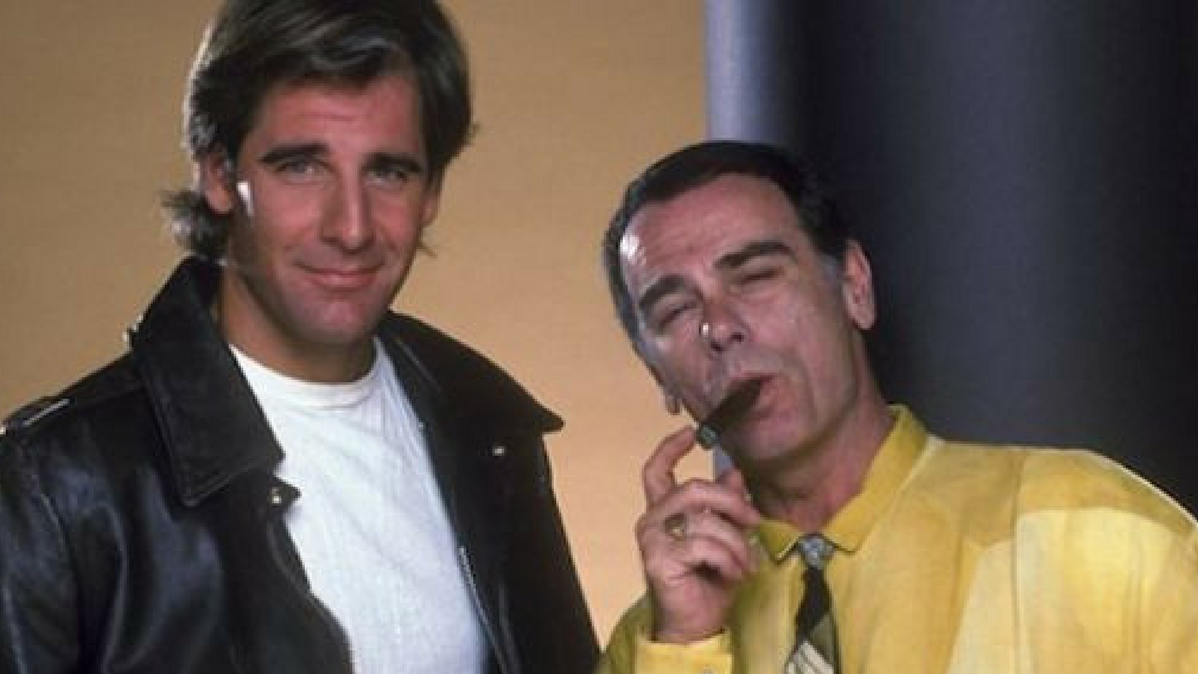 Sam Beckett (Scott Bakula) and his AI hologram companion Al (Dean Stockwell) look ready for another leap. (Image: NBCUniversal)