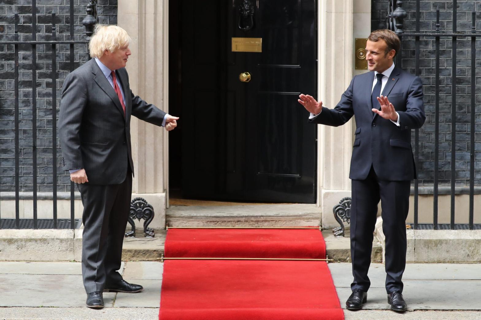 Prime Minister, Boris Johnson greets French President, Emmanuel Macron while keeping a social distance at Number 10 Downing Street on June 18, 2020. (Photo: Dan Kitwood, Getty Images)