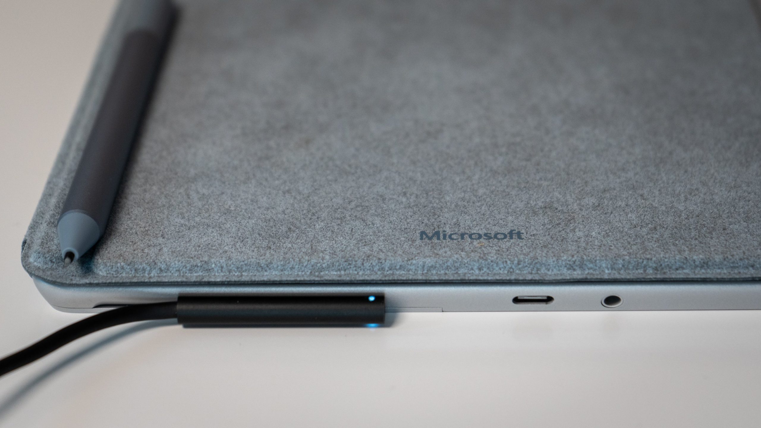 The Surface Go 3 charges via a Surface Connect adaptor. (Photo: Florence Ion / Gizmodo)