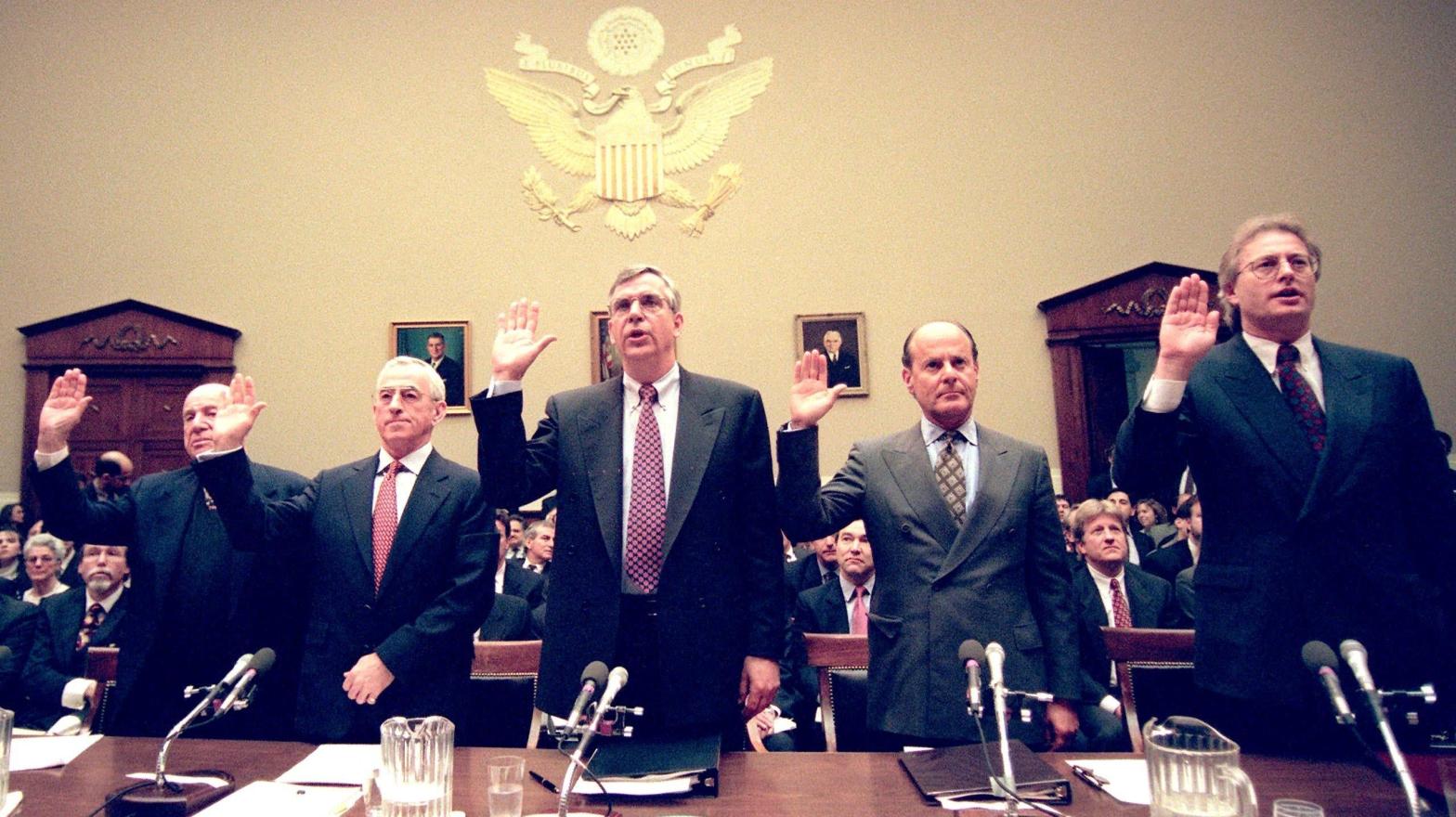 Five tobacco industry executives are sworn in before testifying in front of the US House Commerce Committee on Capitol Hill in Washington, DC. on January 29, 1998. (Photo: Jessica Perrson/AFP, Getty Images)