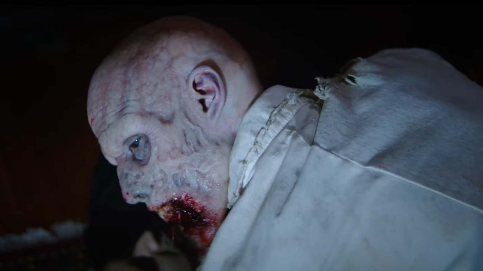 Resident Evil's iconic first zombie reveal, recreated. (Screenshot: Sony Pictures)