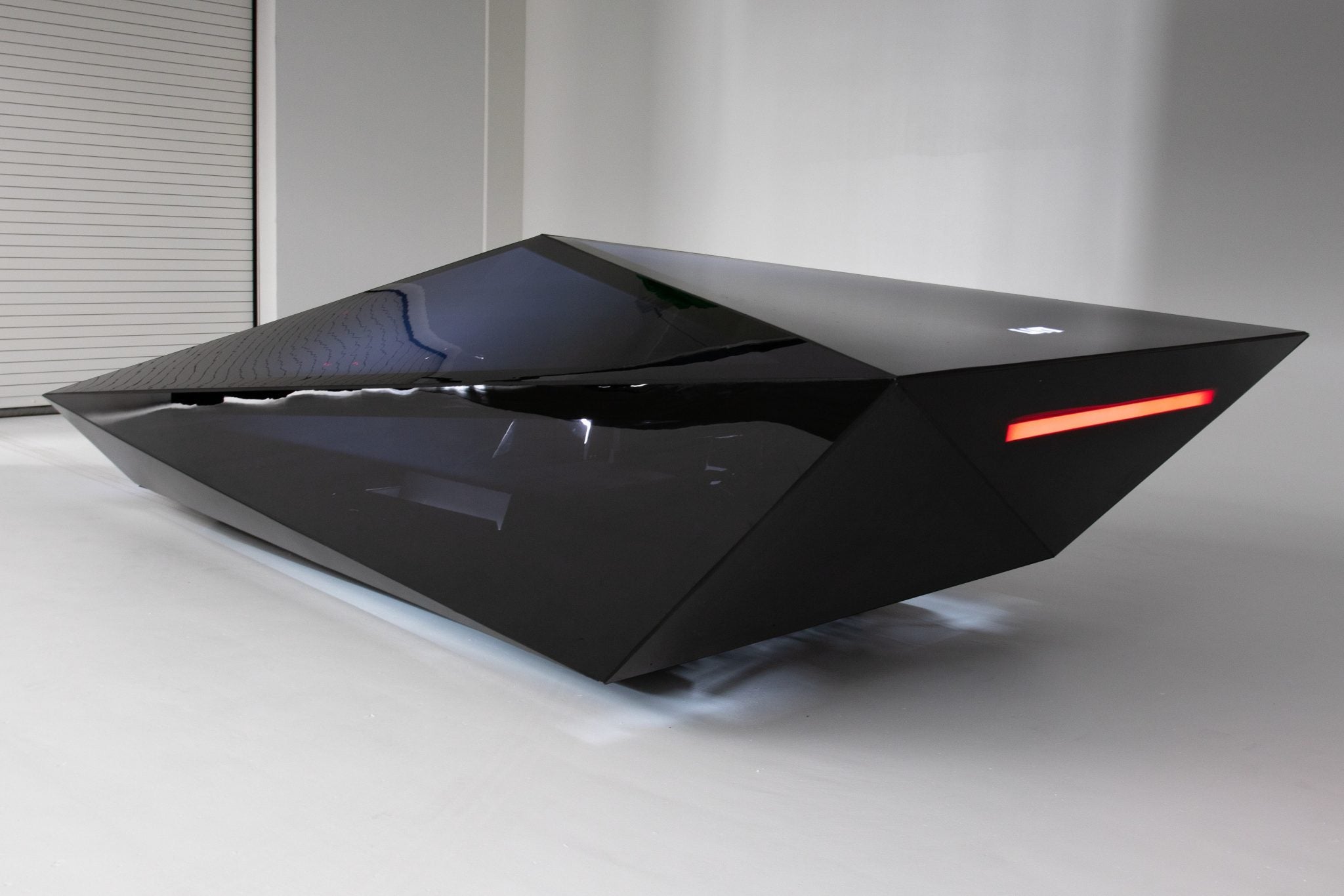 The Fantastic ‘Lo-Res Car’ Looks Like A WiFi Router And Is Begging For A Drivetrain Swap
